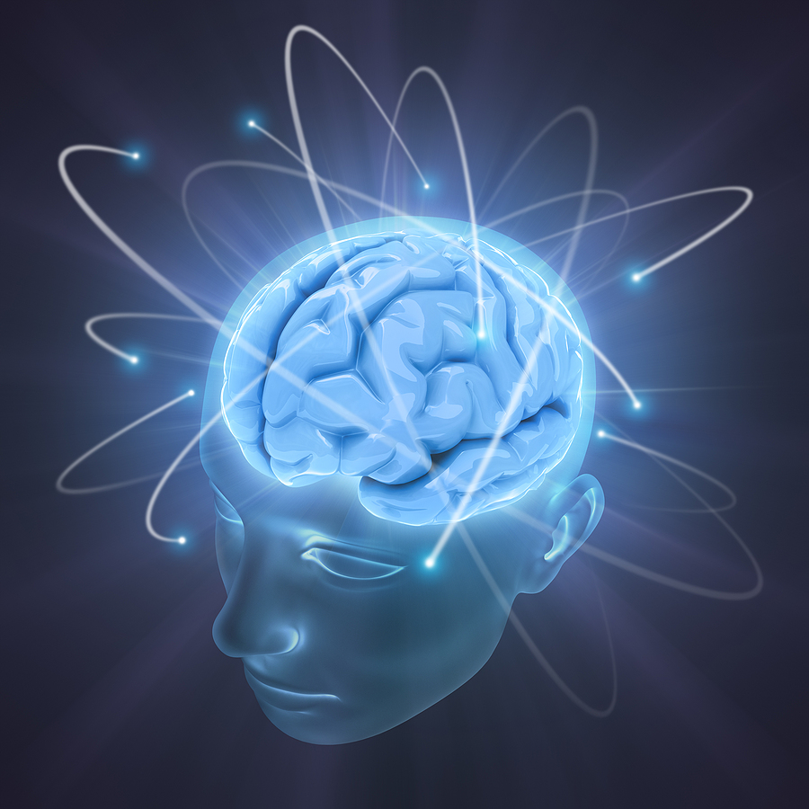 Glowing blue brain inside translucent head silhouette with orbiting energy particles